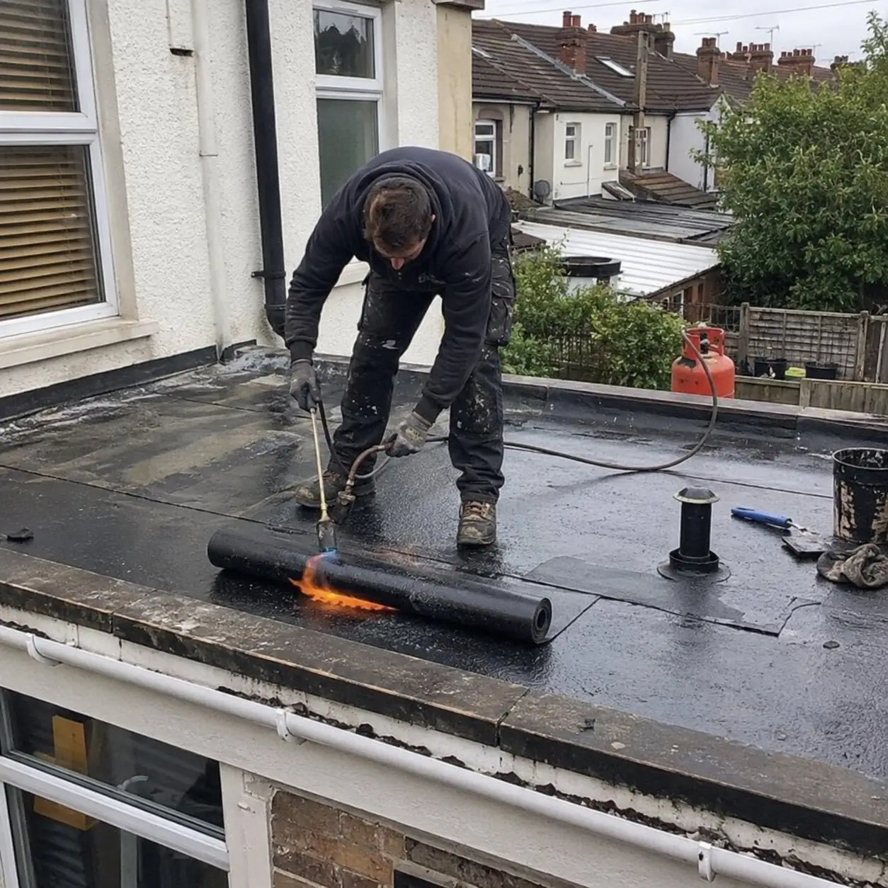 Torch-on felt flat roof repair